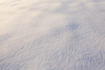 White fluffy snow, texture or background, top view.