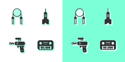 Set Toy piano, Jump rope, Ray gun and Dart arrow icon. Vector.