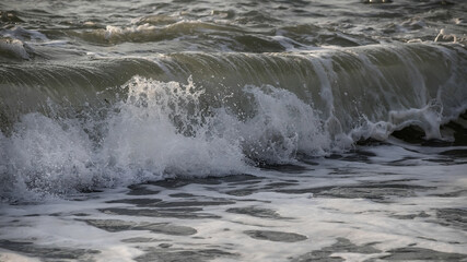 Sea wave close-up. Sea foam.