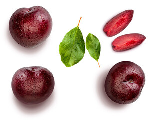 Plums from different angles and leaves isolated on white background. Appetizing and healthy red...