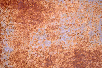 Abstract background of the rusted metal. Grunge old iron panel.