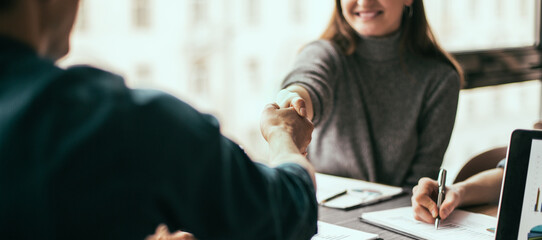 close up. employee making financial calculations on a laptop.