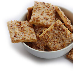 Traditional italian cookies with hazelnut and sugar glaze isolated on white background