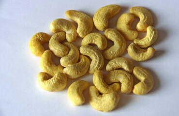 Cashew nuts on a white background. Nutritional samples. Selective background.