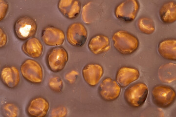 Macro photo of a sweet, delicious bar of chocolate photo taken from above