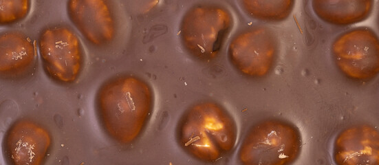 Macro photo of a sweet, delicious bar of chocolate photo taken from above