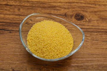 Raw cous cous heap in the bowl