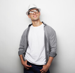 Young man wearing white hat and glasses