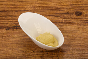 Dijon mustard sauce in the bowl