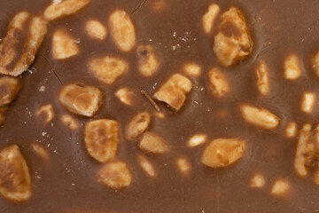 Macro photo of a sweet, delicious bar of chocolate photo taken from above