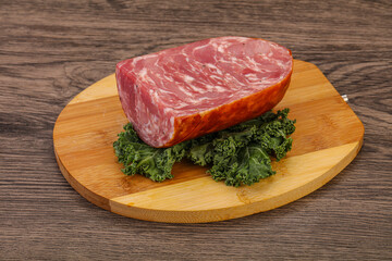 Beef ham piece over board