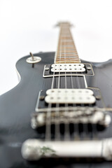 Fototapeta na wymiar leisure, music and musical instruments concept - close up of bass guitar strings