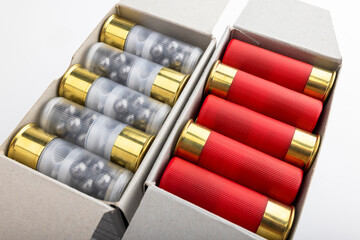 Paper box with 12 gauge shotgun shells used for hunting isolated on white background