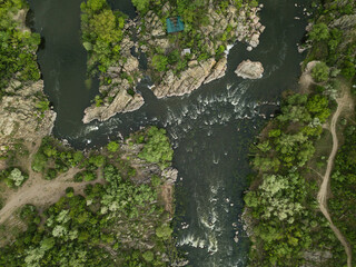 Aerial rocky landscape on Southern Bug River with rapids. Ukraine