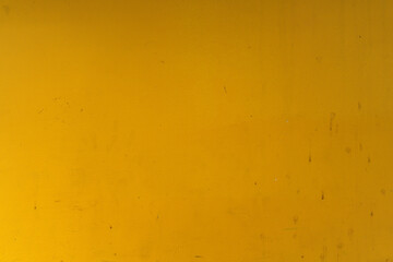 Abstract yellow cement wall texture and background. Modern grafitty wallpaper. A wall have some grunge effects and lines.