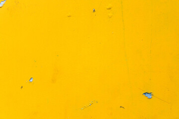 Abstract yellow cement wall texture and background. Modern grafitty wallpaper. A wall have some grunge effects and lines.