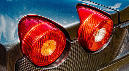 Beautiful rear light details on a famous sports car with lots of carbon fibre