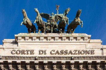 Naklejka premium Quadriga at the top of Palace of Justice seat of Supreme Court of Cassation (Corte di Cassazione), Rome, Italy