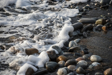Sea wave close-up. Sea foam. Water spray