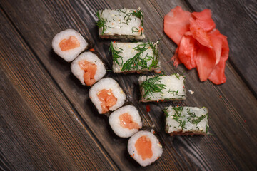 ginger seafood wooden table sushi and rolls delicacy