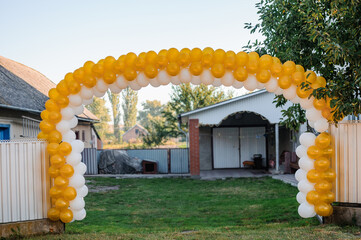 Wedding arch made of colorful inflatable balloons. Celebration of a children's party. arch made...