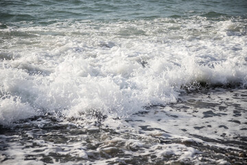 Sea wave close-up. Sea foam.