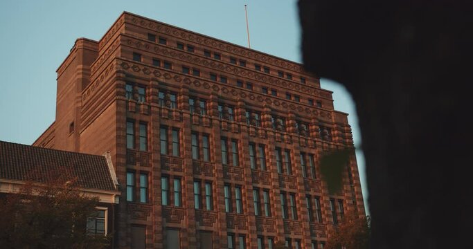 Exterior Facade Of De Bazel, A Monumental Building On The West Side Of Vjzelstraat In Amsterdam, Netherlands. low angle shot
