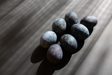 Easter painted eggs with marble effect on gray background. Happy easter 2021. 