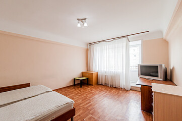 Russia, Moscow- April 24, 2020: interior room apartment modern bright cozy atmosphere. general cleaning, home decoration, preparation of house for sale. bedroom with bed