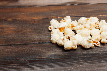 popcorn on a wooden table snack classic delicacy