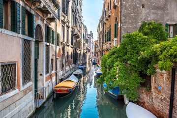 Obraz na płótnie Canvas Historic houses over beautiful canals. Venice, Italy