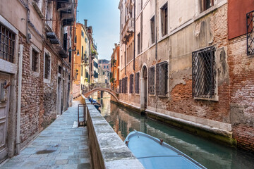 Fototapeta na wymiar Historic buildings over the beautiful canal. Venice, Italy