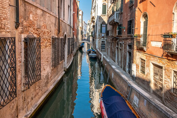 Fototapeta na wymiar Historic houses over beautiful canals. Venice, Italy