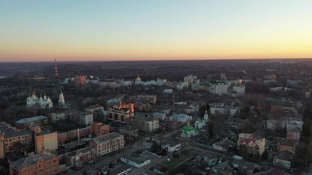 Europe, Poltava, Ukraine - March 2021: Aerial view of the city. Sights of the city from above. Beautiful sunset.