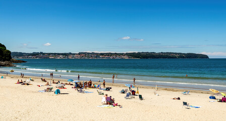 Fototapeta na wymiar Panoramic summer scene in the beautiful beach of Miño, in the Galicia region of Spain.