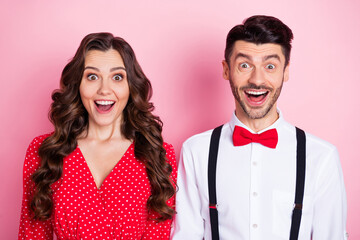 Portrait of nice impressed brown hair couple she wear dress he shirt isolated on pastel pink color background