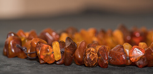 Jewelry made of natural amber stones. Selective focus.