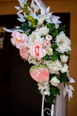 Wedding arch with multi-colored flowers. Wedding decorations