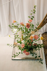 Wedding arch with multi-colored flowers. Wedding decorations