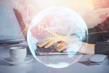 Multi exposure of woman hands typing on computer and business theme hologram drawing. Success...