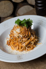 Pasta bolognese in white plate