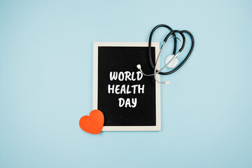 World Health Day, medical and healthcare. Stethoscope and text World Health Day in frame on blue background