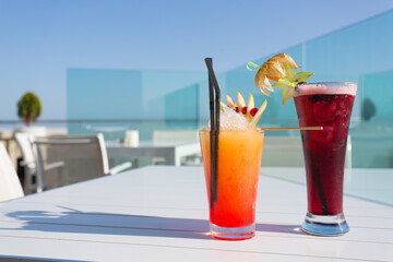 Two different cocktails on the table