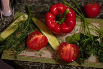 Cut vegetables and herbs on a board