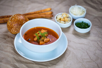 Hot soup in white plate