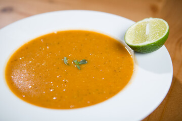 Soup from orange lentil and lemon