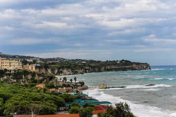 coastline in calabria with blue sky and mediterranean sea