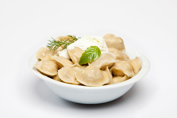 Cooked dumplins Ravioli and paprika