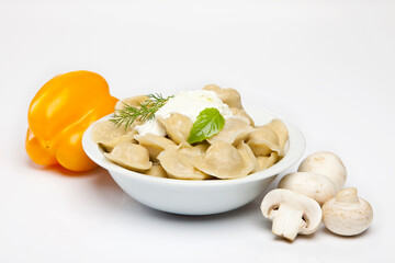 Cooked dumplins Ravioli and paprika