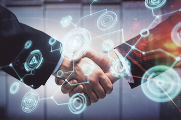 Double exposure of social network theme hologram and handshake of two men.